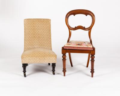 Appraisal: A Victorian nursing chair on turned and ebonised front legs