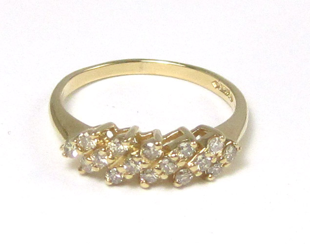 Appraisal: DIAMOND AND FOURTEEN KARAT GOLD RING set with round full-cut