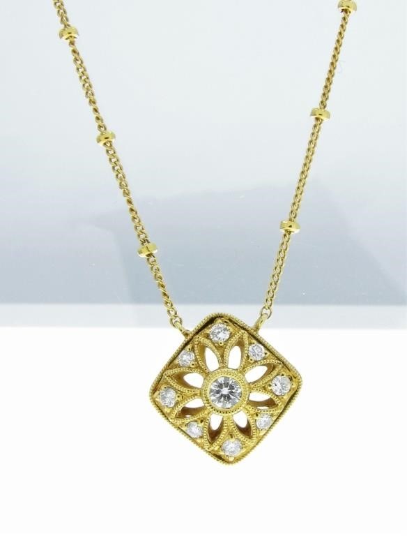 Appraisal: An K yellow gold diamond necklace primarily featuring a cushion