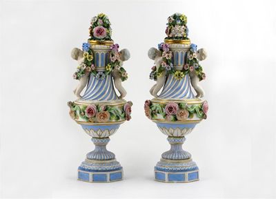 Appraisal: A pair of French Meissen-style vases and covers each applied