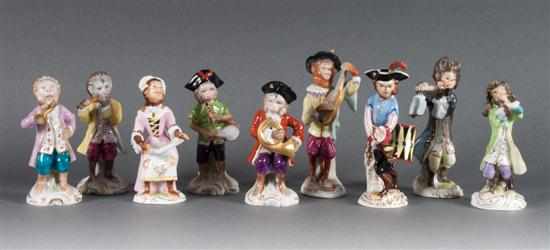 Appraisal: German porcelain nine-piece monkey orchestra early th century some with