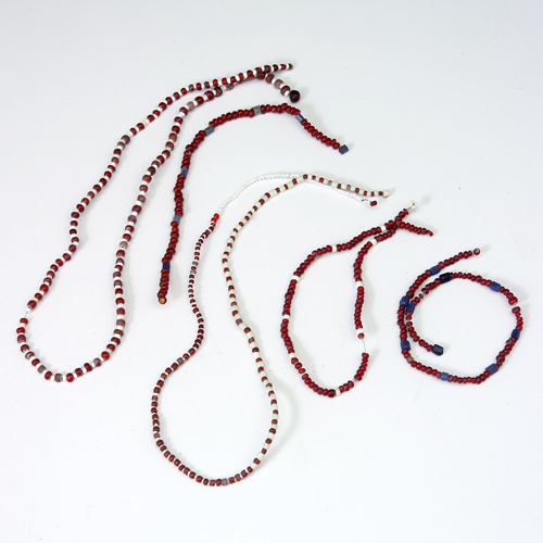 Appraisal: th c Native American trade beads of cobalt red and