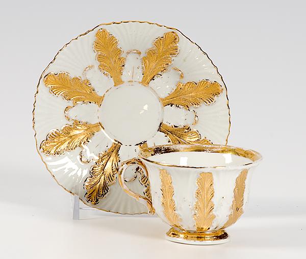 Appraisal: MEISSEN CUP AND SAUCER German late th century molded vertical