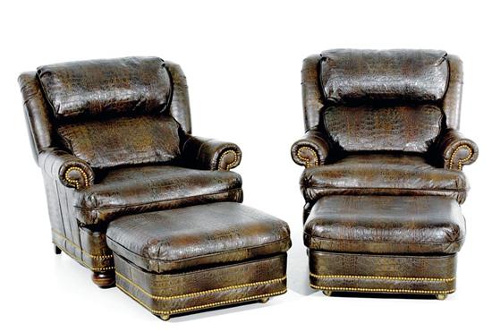 Appraisal: Pair leather faux alligator club chairs with ottomans topnailed with