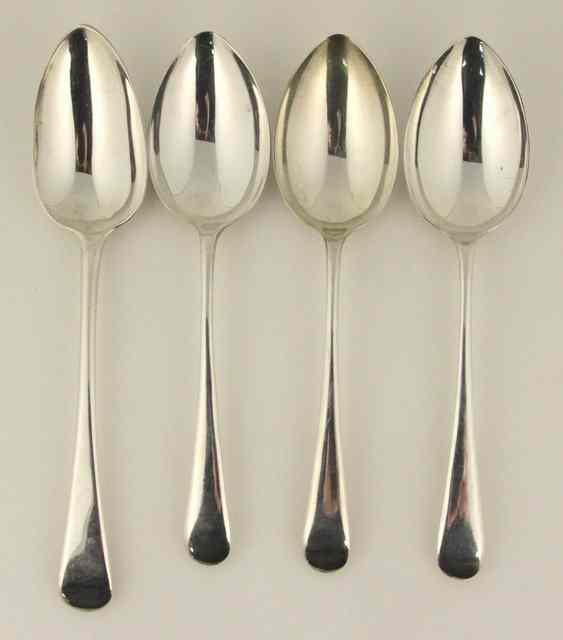 Appraisal: Three silver table spoons Sheffield and a table spoon London