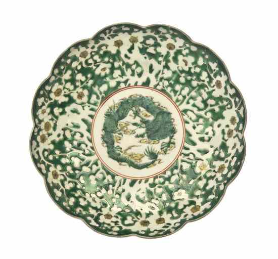 Appraisal: A Chinese Famille Verte Dish having a scalloped rim with