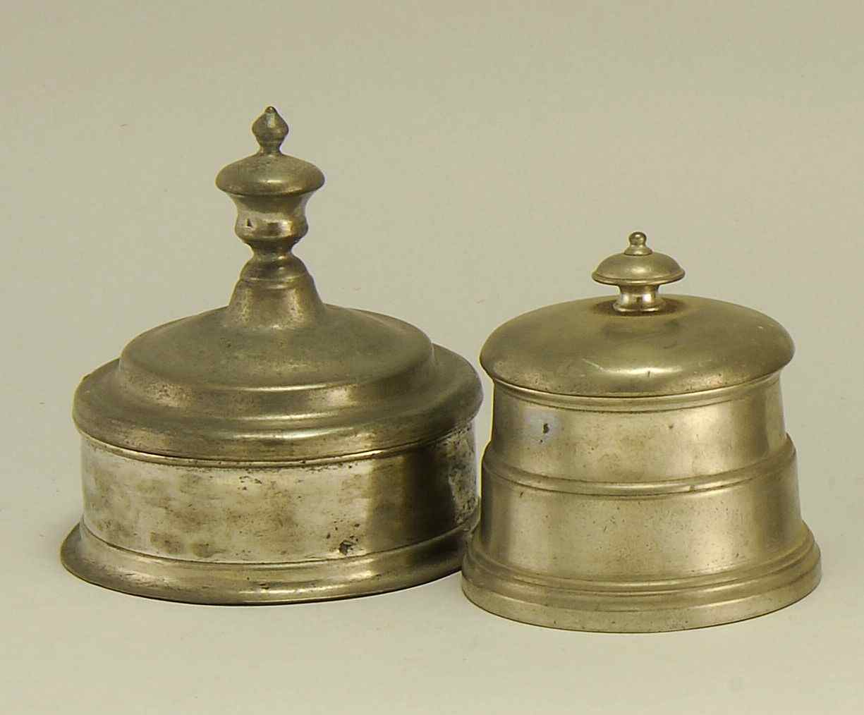 Appraisal: TWO CONICAL PEWTER TOBACCO BOXESLate th Early th CenturyWith weights