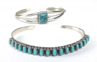 Appraisal: Two Navajo sterling and turquoise bangles one signed J Regay