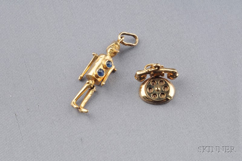 Appraisal: Two kt Gold Charms an articulated tin man belly with