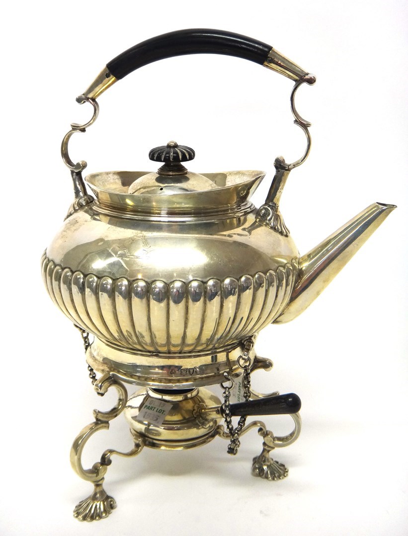 Appraisal: A Victorian silver spirit kettle and stand the kettle of