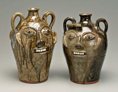 Appraisal: Two Walter Fleming face jugs both with broken china teeth