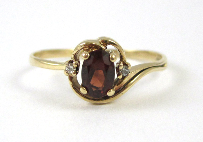 Appraisal: GARNET DIAMOND AND FOURTEEN KARAT GOLD RING with two round-cut