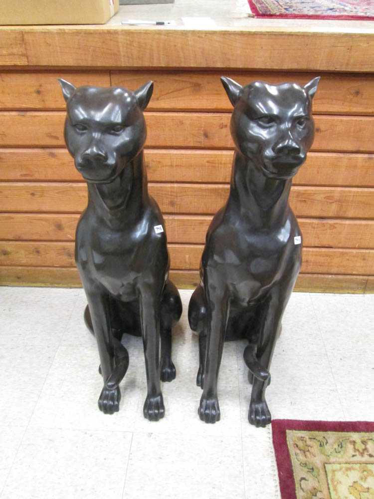 Appraisal: PAIR OF BRONZE PUMAS in seated position Each measuring H