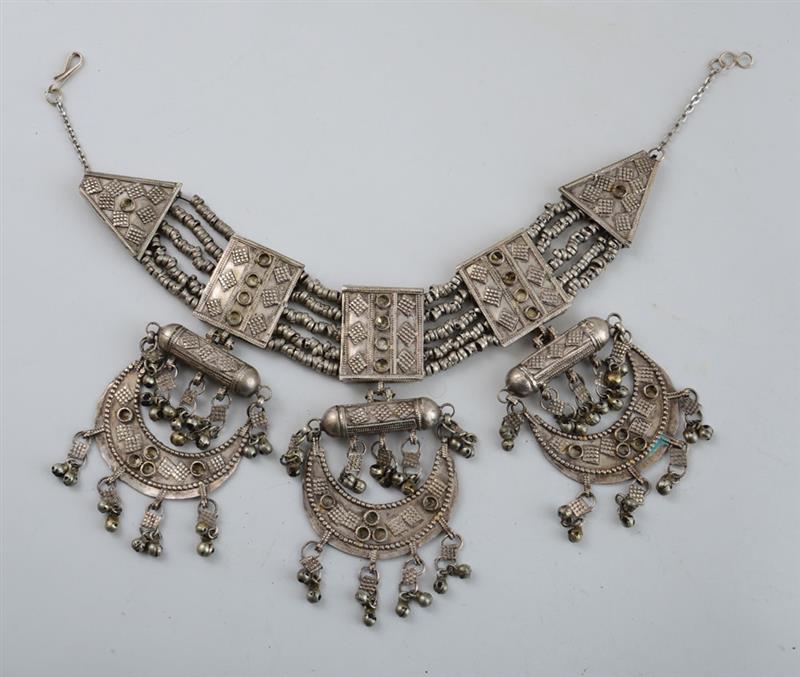 Appraisal: SUDANESE SILVERED METAL NECKLACE With three crescent-form bead-hung pendants Approx