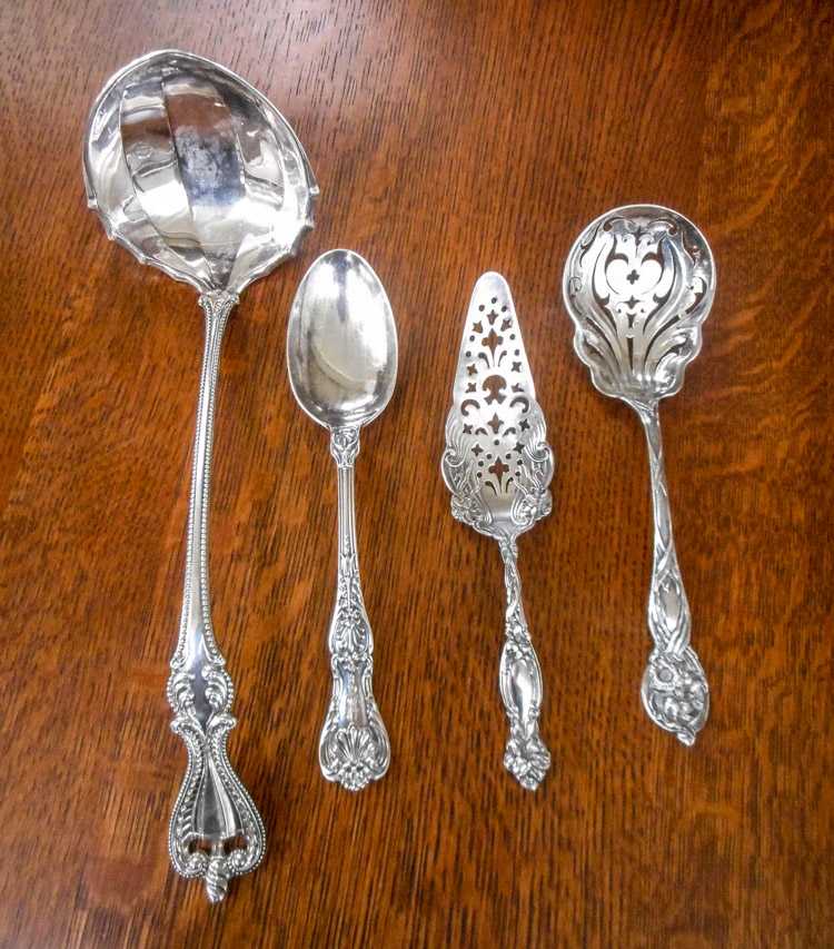 Appraisal: FOUR STERLING SILVER FLATWARE PIECES punch ladle pierced cheese server