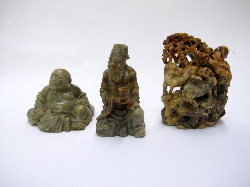 Appraisal: Three Chinese carved soapstone figures depicting a buddha a sage