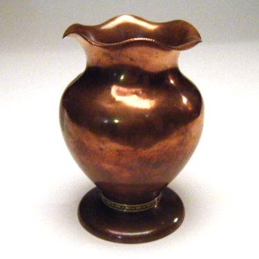 Appraisal: ALBERT BERRY Hammered copper vase with brass detail around base