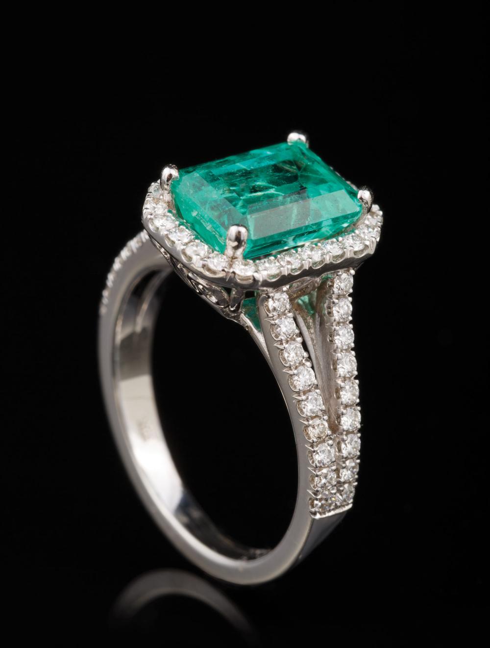 Appraisal: kt White Gold Emerald and Diamond Ring center prong set