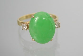 Appraisal: A Jadeite and Diamond Ring k yellow gold band set