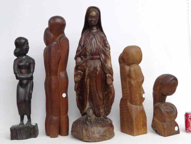 Appraisal: Lot five misc Ethnic carvings including woman Saint marked ''Haiti