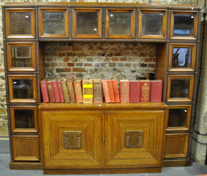 Appraisal: Heavy quality large Continental flame walnut large wall cabinet with