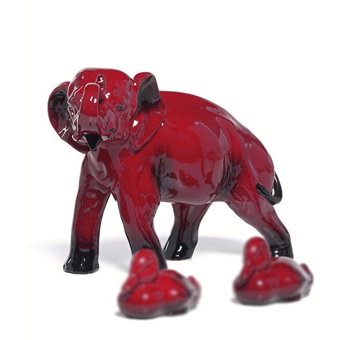 Appraisal: Royal Doulton figurine elephant covered in a red flambe glaze