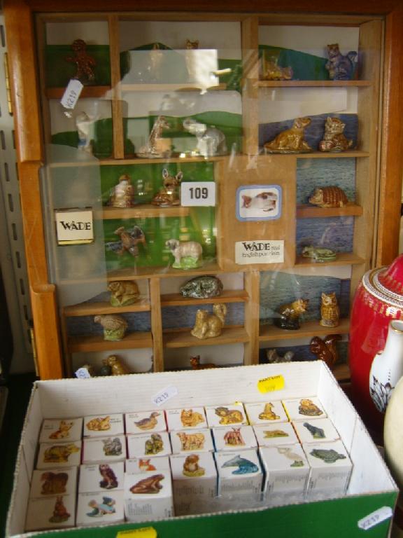 Appraisal: A display case containing a quantity of Wade Whimsies including