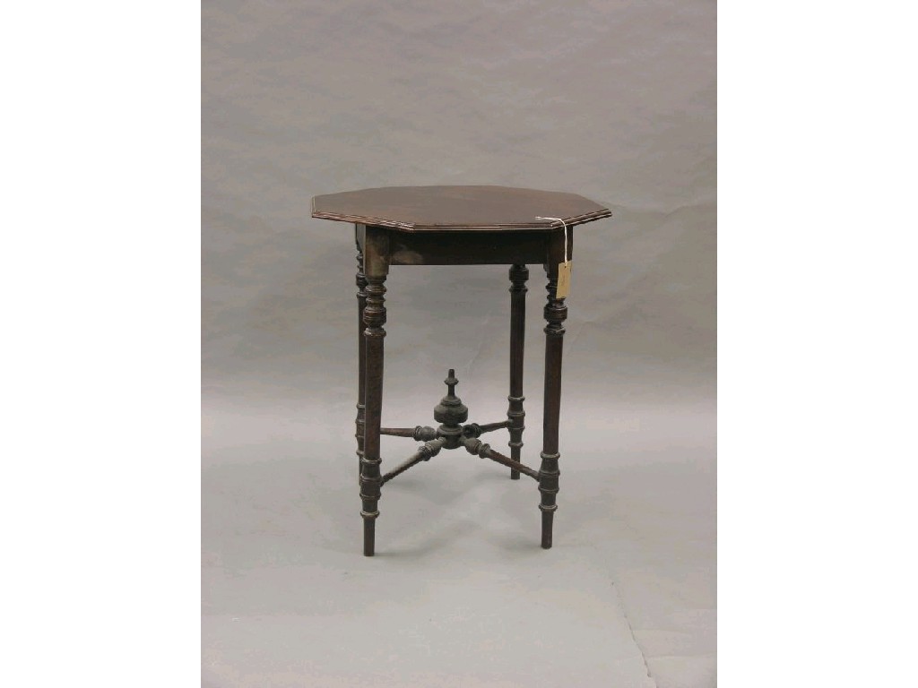 Appraisal: A late Victorian walnut occasional table octagonal top on turned