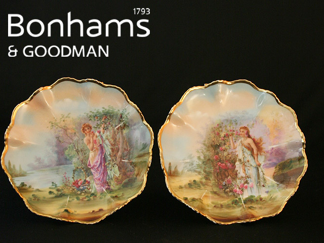 Appraisal: A pair of Austrian porcelain plates painted with maidens in