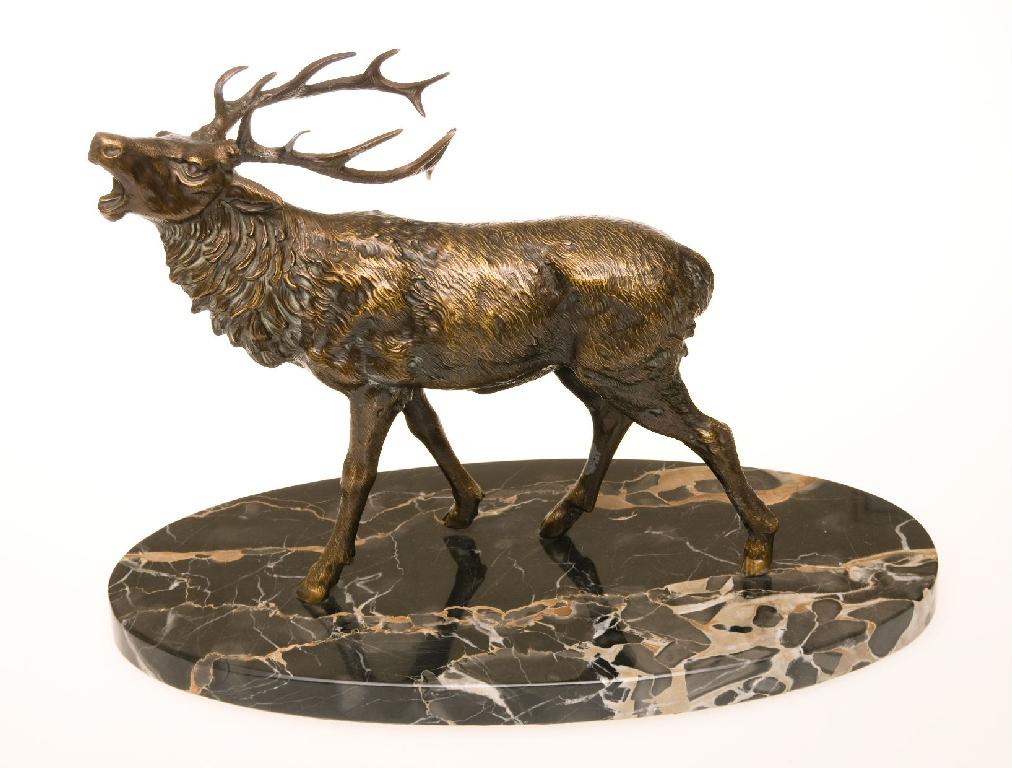 Appraisal: PATINATED BRONZE MODEL OF A BAYING STAG mounted on an