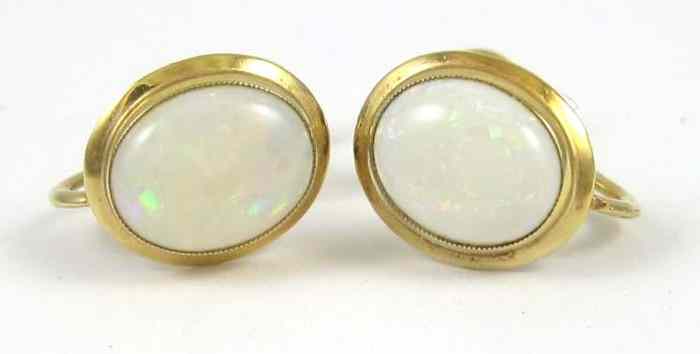 Appraisal: PAIR OF OPAL AND FOURTEEN KARAT GOLD EARRINGS each set