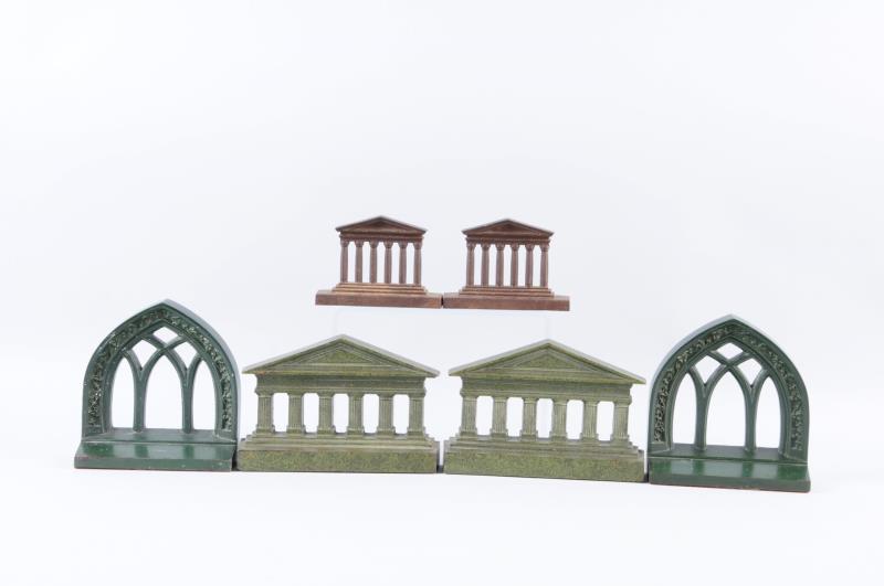 Appraisal: Cast Iron Assorted Column Bookends Two pair by Bradley Hubbard