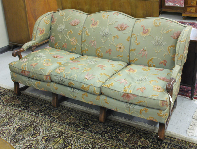 Appraisal: GREEN UPHOLSTERED MAHOGANY WING-BACK SOFA American mid- th century the