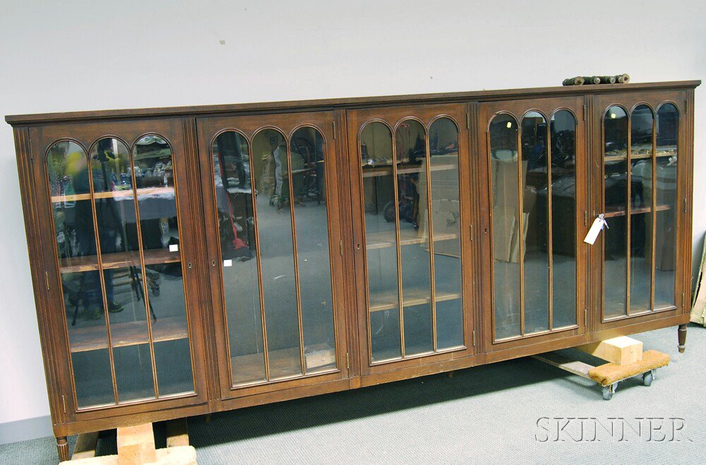 Appraisal: Walnut Veneer Glazed Five-door Cabinet each hinged door with three