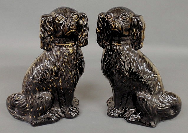 Appraisal: Pair of Staffordshire Jackfield black standing Spaniels c h x