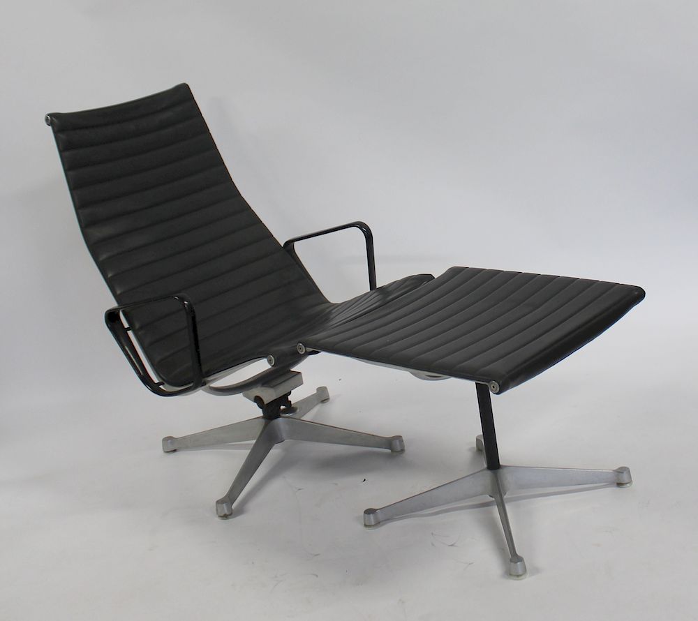 Appraisal: MIDCENTURY Charles Eames Alluminium Group High Back Chair and Ottoman