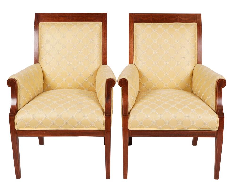 Appraisal: PAIR OF ENGLISH STYLE INLAID MAHOGANY CLUB CHAIRSwith a yellow