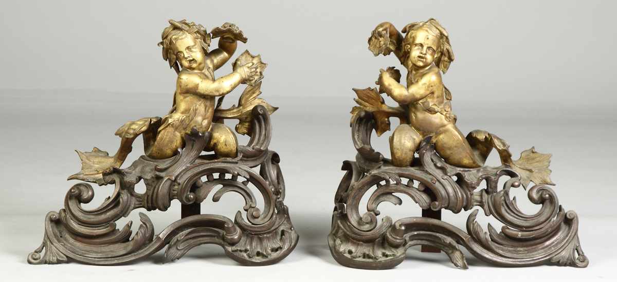 Appraisal: Pair of Bronze French Chenets th cent Cherub-type figures holding