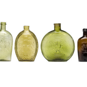 Appraisal: Four Molded Glass Amber and Green Flasks American th Century