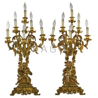 Appraisal: PAIR OF FRENCH BRONZE CANDELABRA -arm with seated cherubs at