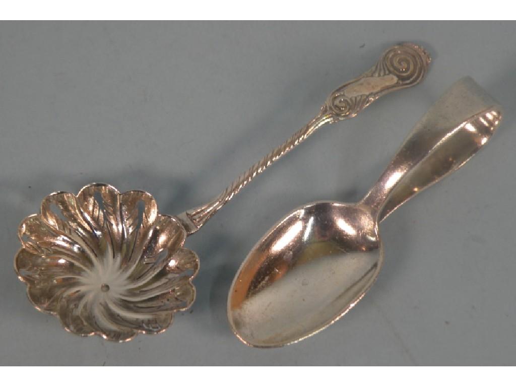 Appraisal: A silver caddy spoon with a folded over handle Birmingham