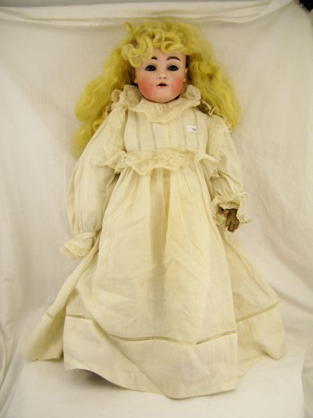 Appraisal: German Porcelain Doll Bisque head with open mouth sleepy blue