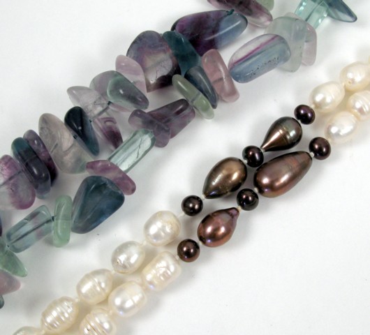 Appraisal: TWO BEADED NECKLACES one strung with green and purple tourmaline