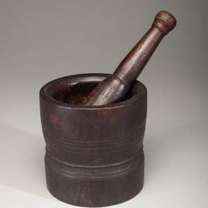 Appraisal: A Lignum Vitae Mortar and Pestle Likely English or Continental