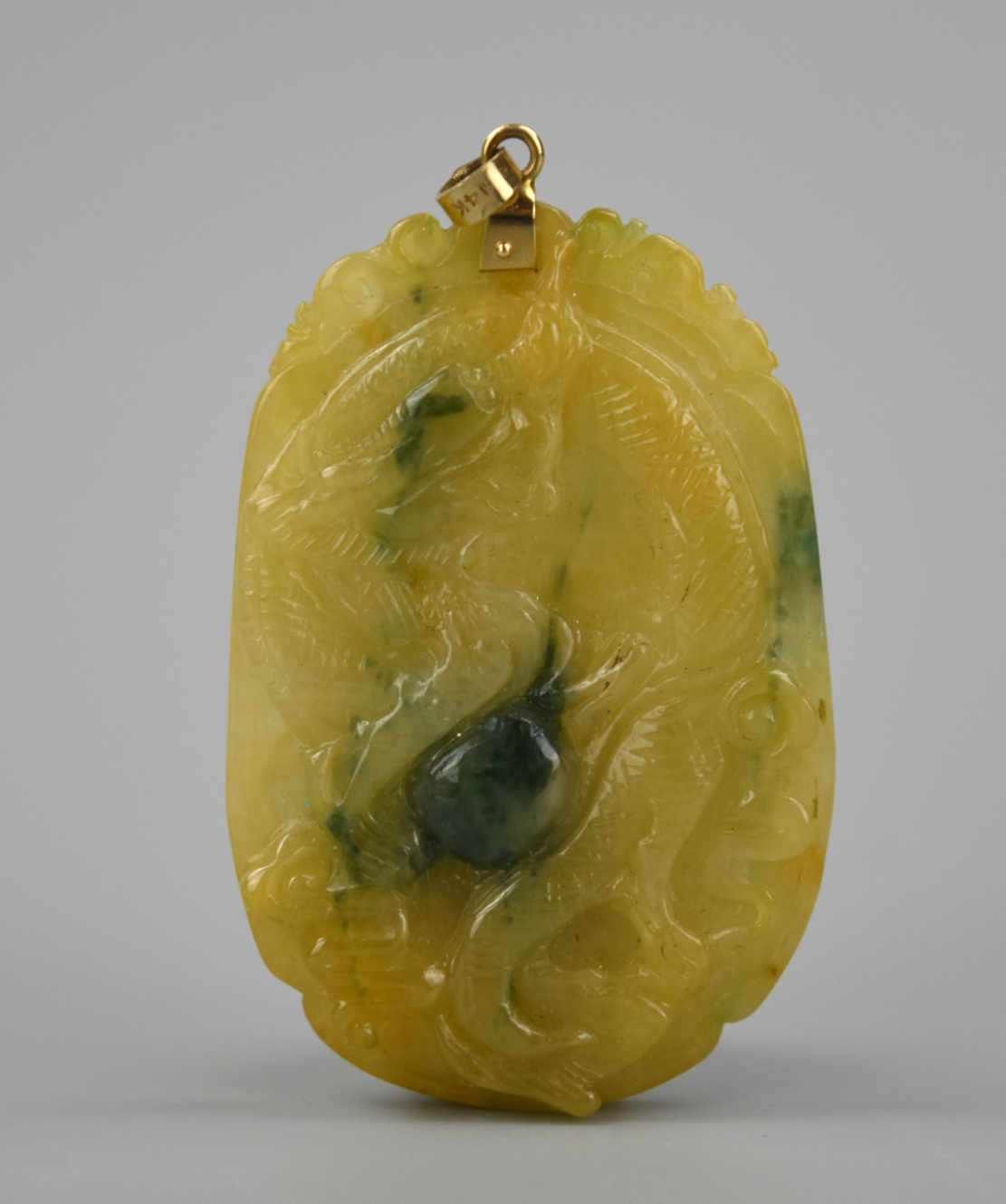 Appraisal: CHINESE JADEITE DRAGON PENDANT W K GOLD A Chinese jade