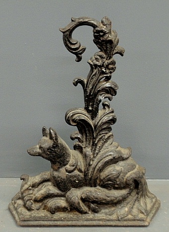 Appraisal: - Victorian cast iron seated fox and branch doorstop h