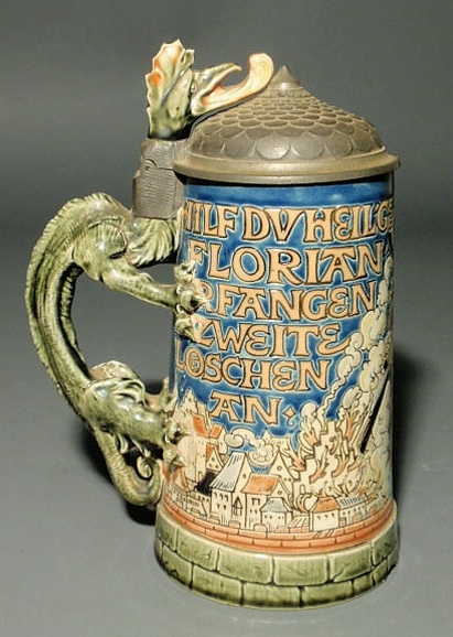 Appraisal: Mettlach stein with dragon form handle h base dia