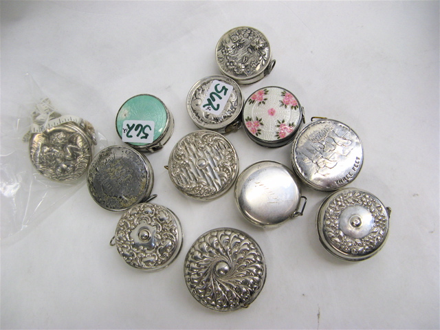 Appraisal: TWELVE STERLING SILVER SEWING TAPE MEASURES various sizes and decorations