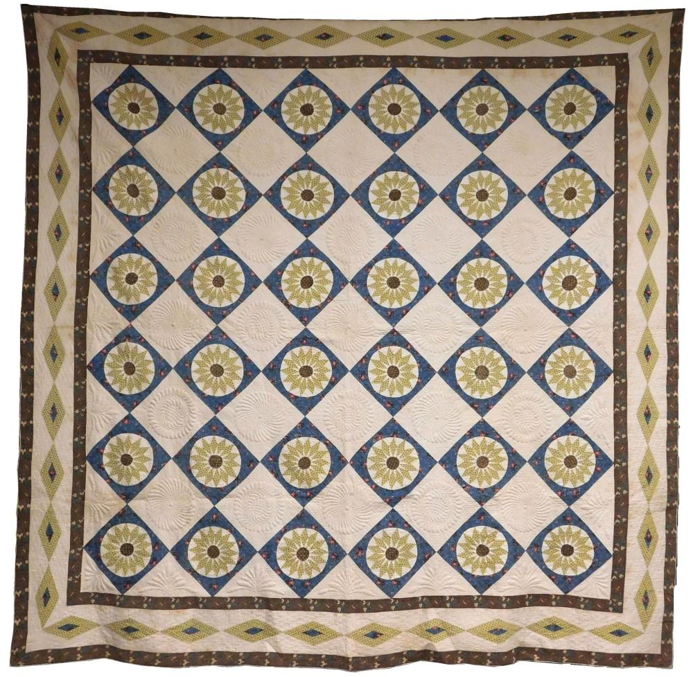 Appraisal: TEXTILE Sunflower quilt with diamond border yellow on blue brown