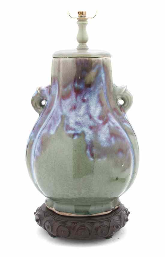 Appraisal: A Chinese Porcelain Hu Form Vase having mottled aubergine and